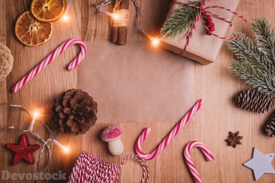 Devostock Christmas Gifts Frame Background Candy Cane Pine 4k