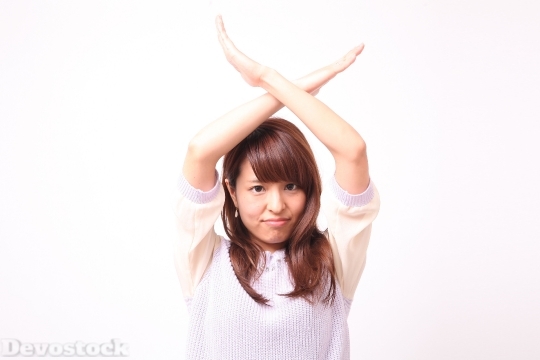 Devostock Girl Body Language Hand Sign No 4k