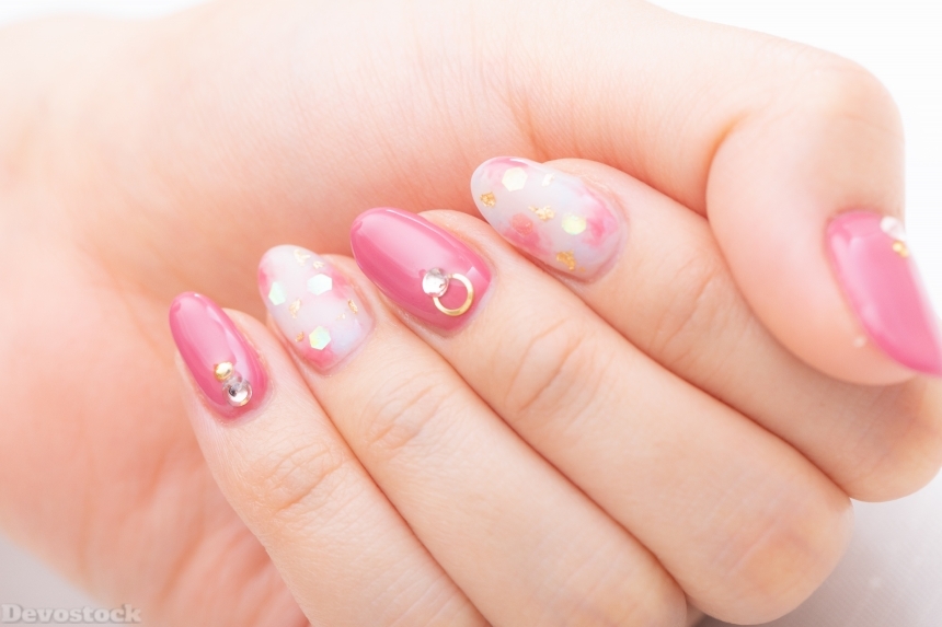 Devostock Girl hand Fingers Nail Arts Pink Color 4k