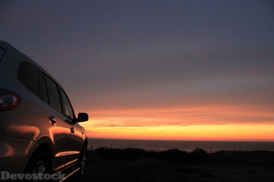 Devostock Sunset Romantic Car 1402 4K