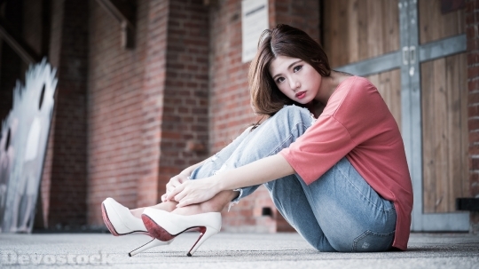 Devostock Beautiful Girl Sitting Jeans 4k