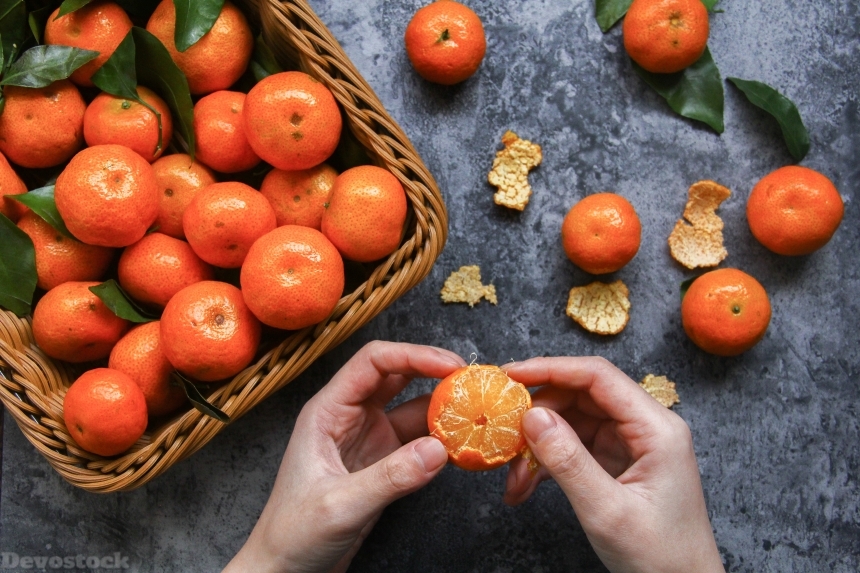 Devostock Food Fresh Fruits Peeling Eat Hands Mandarin Oranges 4k