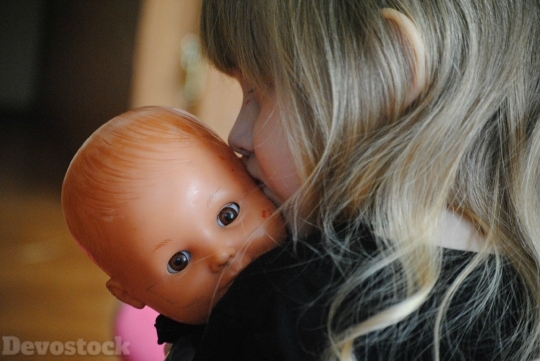 Devostock Girl Baby Doll Love Motherhood Child 4k
