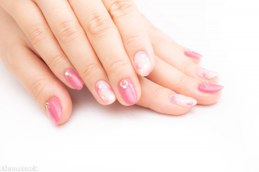 Devostock Girl hands Fingers Nail Arts Pink Color Over 4k