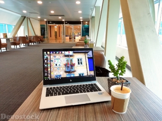 Devostock Lights Laptop Milk Coffee 4K.jpeg