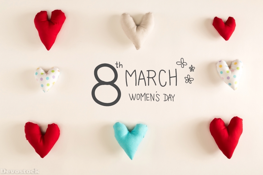 Devostock Women's Day message with blue heart cushions