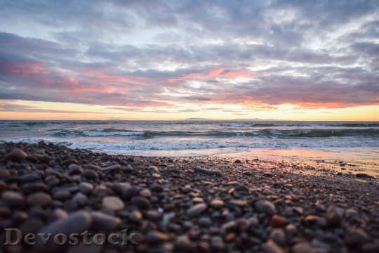 Devostock Beach Sunset Pebbles Stones