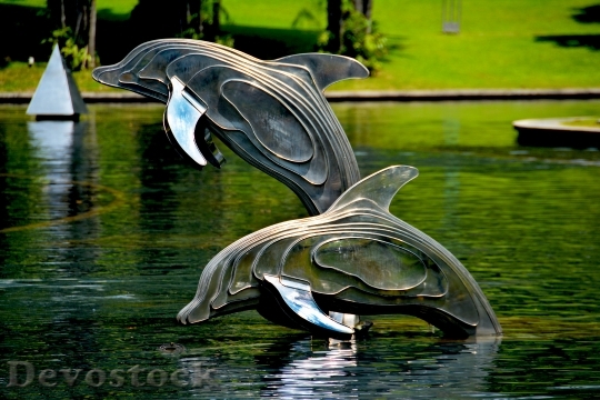 Devostock Dolphins Sculpture Statue Architecture 161989.jpeg