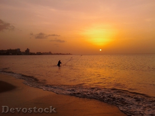Devostock Fisherman Sunset Beach Sea