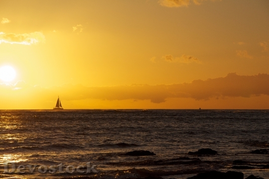 Devostock Hawaii Sunset Sailboat Yellow