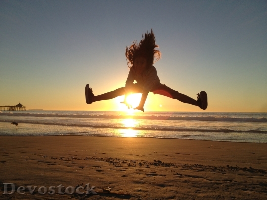 Devostock Jumping Girl Jump Sunset