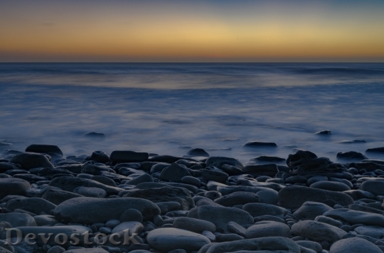 Devostock Pebbles Sea Sunset Calm