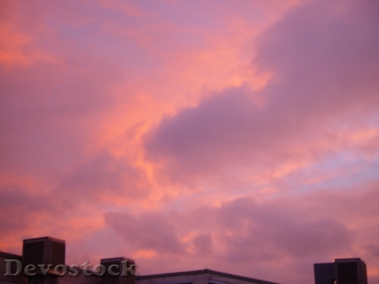 Devostock Pink Clouds In Sunset