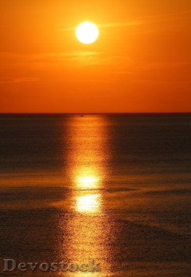 Devostock Sun Lying Sea Sunset