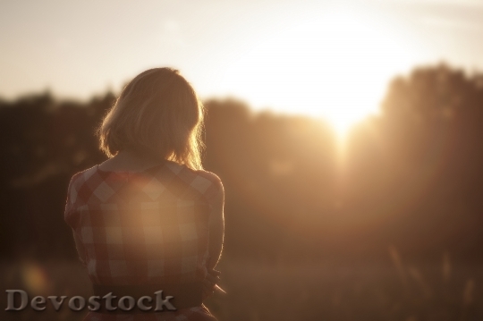 Devostock Sunset Alone Thinking Woman