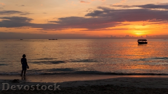 Devostock Sunset Beach Woman Silhouette 0