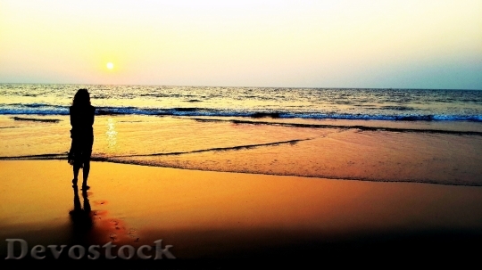 Devostock Sunset Beach Woman Silhouette