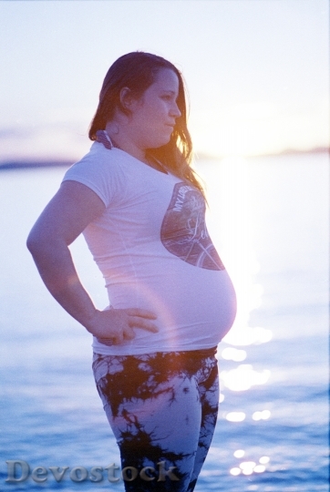 Devostock Sunset Girl Mother Pregnant