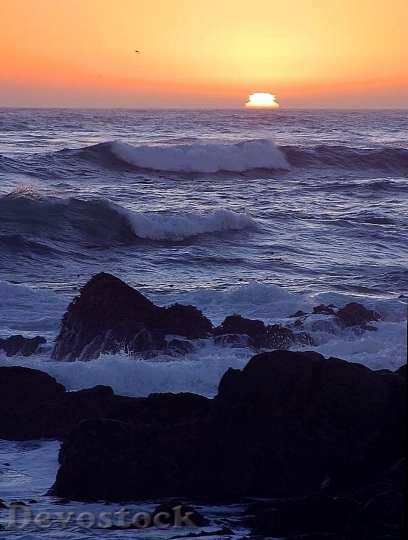 Devostock Sunsets Over Ocean