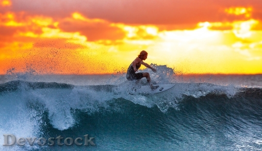 Devostock Surfer Wave Sunset The Indian Ocean 390051.jpeg