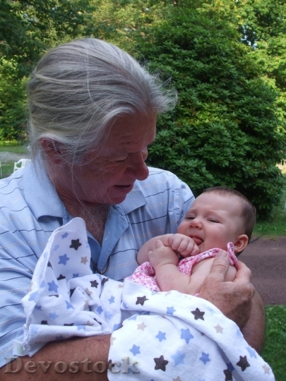 Devostock Grandfather and granddaughter