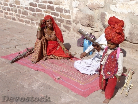 Devostock Indian family in hot weather