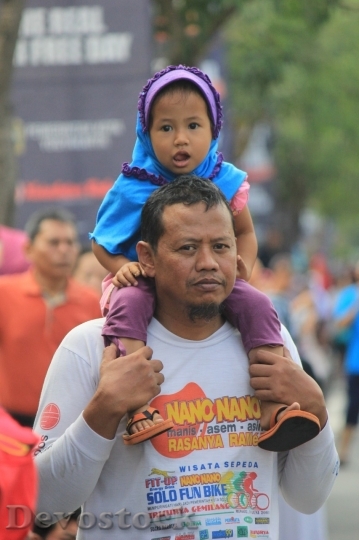 Devostock Malysian father and little girl