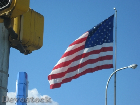 Devostock American Flag In Wind