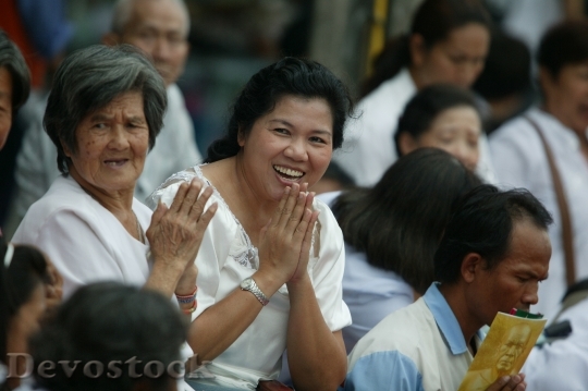 Devostock Asian People Happy Praying