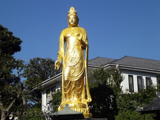Devostock Budha Statue Gold Buddhism