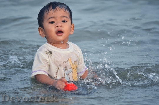 Devostock Child Water Sea Wave