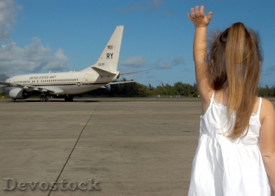 Devostock Child Waving Goodbye Departure