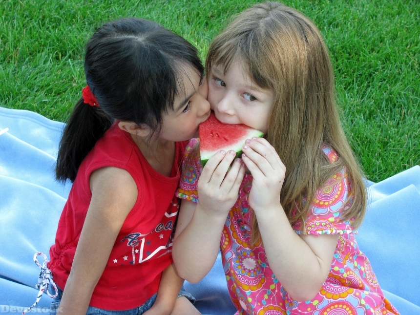 Devostock Children Playing Watermelon Summer
