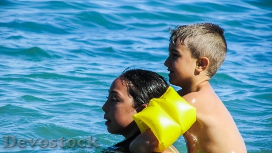 Devostock Children Swimming Playing Water
