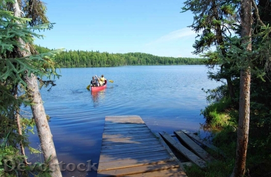 Devostock Family In Canoe On