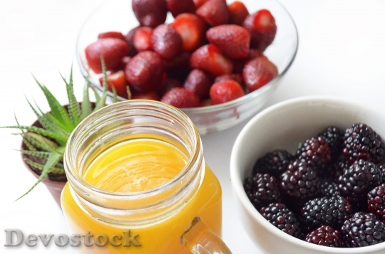 Devostock Fruits Juice Orange Strawberries