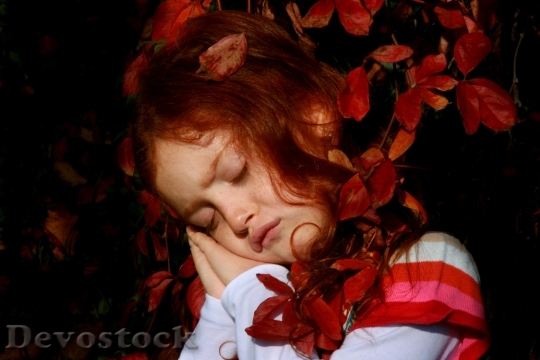 Devostock Girl Leaves Autumn Red 0