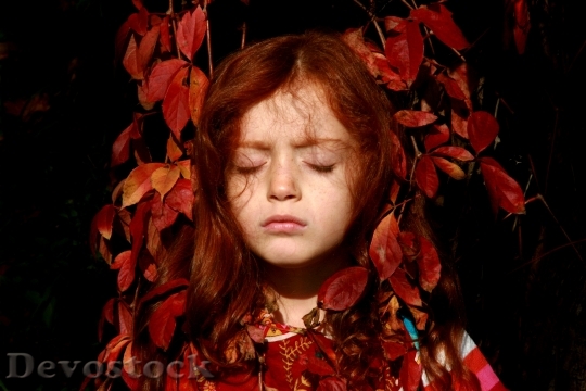 Devostock Girl Leaves Autumn Red