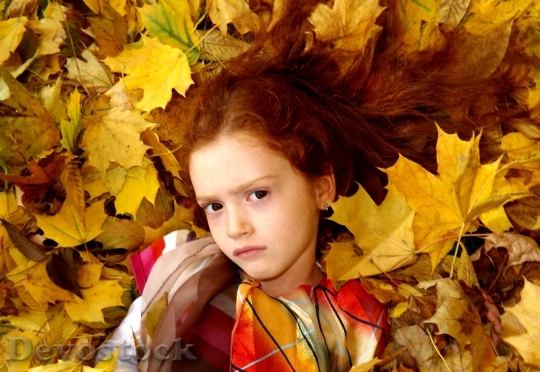 Devostock Girl Leaves Autumn Yellow