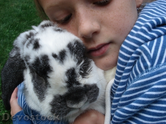 Devostock Girl Rabbit Love Hug
