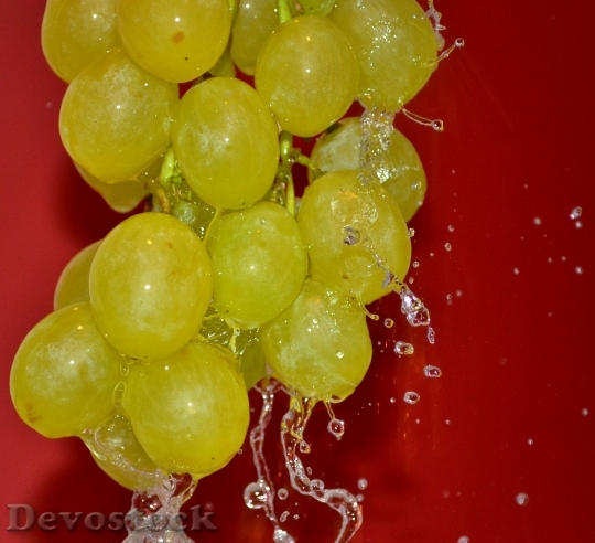 Devostock Grape Cluster Under Pouring