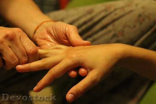Devostock Hand Holding Child Hands