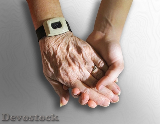 Devostock Hands Old Young Holding