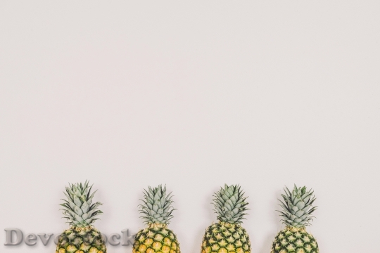 Devostock Pineapples Fruit White Background