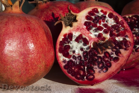 Devostock Pomegranate Red Fruit Sliced