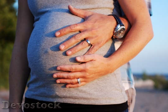 Devostock Pregnancy Hands Woman Maternity