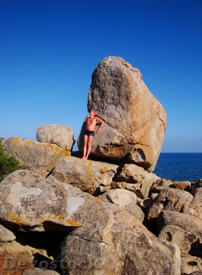 Devostock Stone Sea Rock Man 0