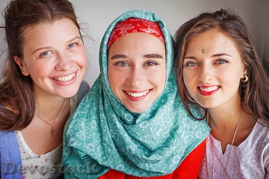 Devostock three-young-friends-of-different-religions-picture$1