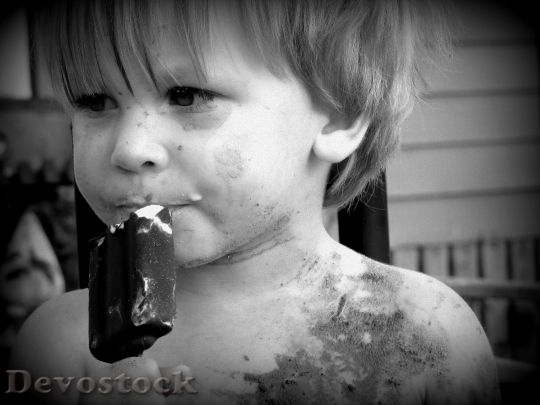 Devostock Boy Eating Ice Cream 0