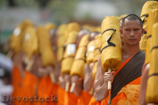Devostock Buddhists Monks Orange Robes
